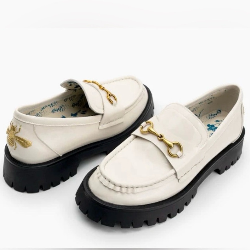 Loafers vegan leather loafer with black lug sole and horsebit buckle.
NWT
